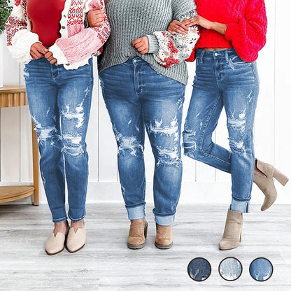 Jeans boyfriend da donna con risvolto, effetto consumato e effetto modellante