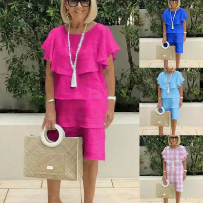 Abito in chiffon al ginocchio con volant e maniche corte