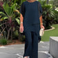 ✨ SCONTO DEL 50% – Set affascinante con top asimmetrico 👗 Elegante completo con pantaloni larghi – Comodo e perfetto per la primavera