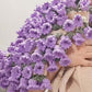 Coperta con bouquet di fiori all'uncinetto