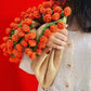 Coperta con bouquet di fiori all'uncinetto