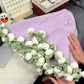 Coperta con bouquet di fiori all'uncinetto
