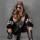 Giacca da donna con cappuccio e maniche in maglia patchwork