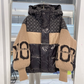 Giacca da donna con cappuccio e maniche in maglia patchwork