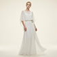 Set con top con maniche a mantella fluide e pantaloni avvolgenti