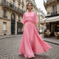 Set con top con maniche a mantella fluide e pantaloni avvolgenti