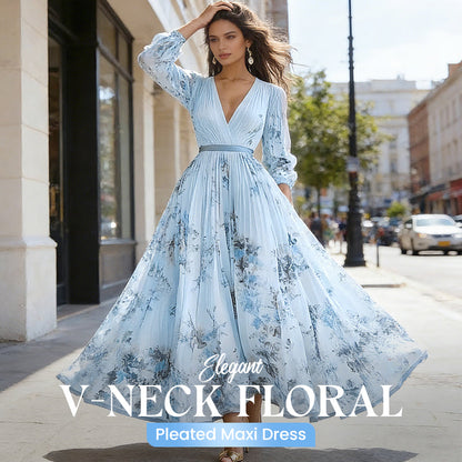 Elegante abito lungo a pieghe con motivo floreale e scollo a V