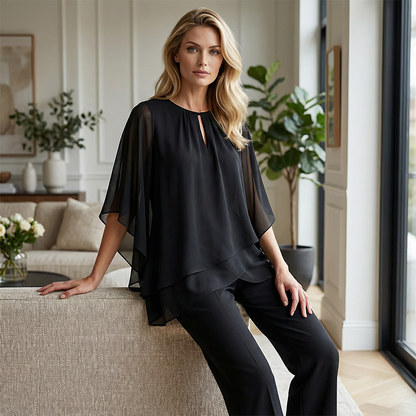 🔥Sconto del 50% fino a esaurimento scorte!🎉Elegante completo a due pezzi: camicetta con orlo asimmetrico e pantaloni larghi