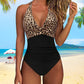 Costume da bagno intero da donna, sexy, con scollo all’americana, senza schienale e con arricciature