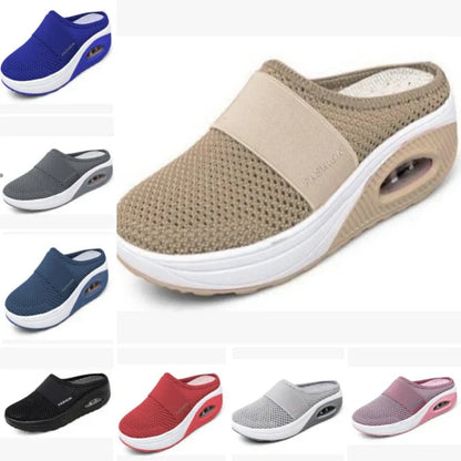 Pantofole da donna casual in tessuto traforato, con fondo piatto e tacco inclinato