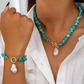 Set composto da collana e bracciale con pezzetti irregolari di turchese