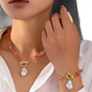 Set composto da collana e bracciale con pezzetti irregolari di turchese