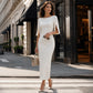 Elegante abito da donna con maniche a spacco