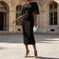 Elegante abito da donna con maniche a spacco