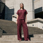 Set composto da top a maniche corte e pantaloni a gamba larga da donna