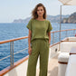 Set composto da top a maniche corte e pantaloni a gamba larga da donna