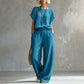 Set composto da top a maniche corte e pantaloni a gamba larga da donna