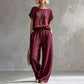 Set composto da top a maniche corte e pantaloni a gamba larga da donna