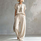 Set composto da top a maniche corte e pantaloni a gamba larga da donna
