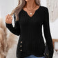 Top in maglia da donna con scollo a V e orlo asimmetrico
