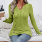 Top in maglia da donna con scollo a V e orlo asimmetrico
