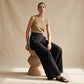 Pantaloni da donna con avvolgimento irregolare e gambe larghe