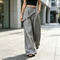 Pantaloni da donna con avvolgimento irregolare e gambe larghe