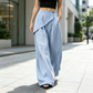 Pantaloni da donna con avvolgimento irregolare e gambe larghe