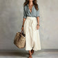 Completo da donna con camicia elegante e gonna con cintura