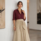 Completo da donna con camicia elegante e gonna con cintura