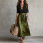 Completo da donna con camicia elegante e gonna con cintura