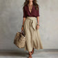 Completo da donna con camicia elegante e gonna con cintura