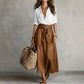Completo da donna con camicia elegante e gonna con cintura