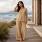 Completo da donna con top a maniche lunghe scollo a V e pantaloni a gamba larga