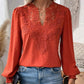 Top elegante da donna a maniche lunghe