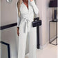 Elegante tuta monocolore, sexy, dalla vestibilità aderente e con scollo a V