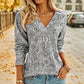 Top da donna elegante con stampa floreale e scollo a V