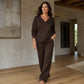 Completo da donna con felpa spalle scoperte e pantaloni