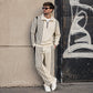 Set da ginnastica da uomo composto da felpa con mezza zip stampata e pantaloni