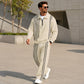 Set da ginnastica da uomo composto da felpa con mezza zip stampata e pantaloni