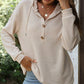 Top da donna trendy a maniche lunghe con cappuccio e colore tinta unita