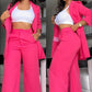 Completo da donna elegante con blazer a revers dentellato e pantaloni a gamba larga