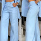 Completo da donna elegante con blazer a revers dentellato e pantaloni a gamba larga