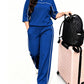 Completo casual da donna: top a maniche corte e pantaloni