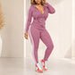 Set felpa con zip e pantaloni a righe da donna