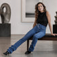 Jeans asimmetrici a vita alta con incrocio per donna