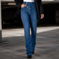 Jeans asimmetrici a vita alta con incrocio per donna