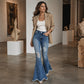 Jeans svasati strappati a vita alta da donna