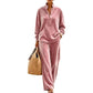 Completo da donna: camicia a maniche lunghe con bottoni e pantaloni a gamba larga